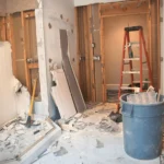 Structure mid-collapse during controlled demolition