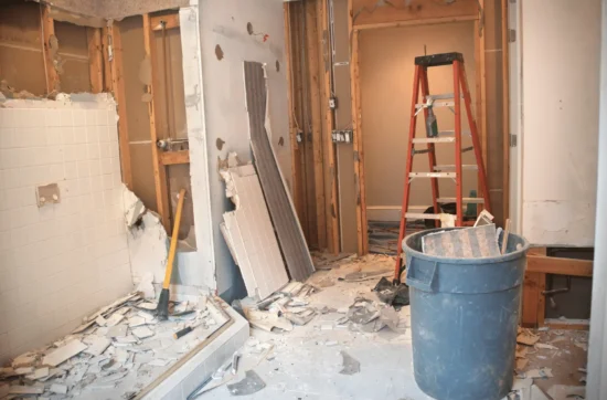 Structure mid-collapse during controlled demolition