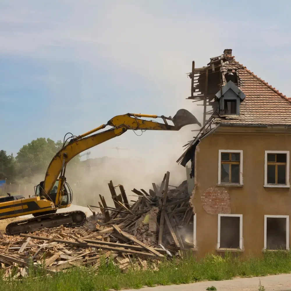 Bulldozer pushing rubble on construction site
