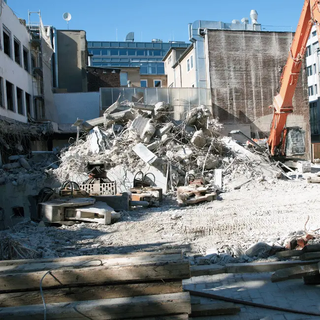 Remote-controlled demolition robot at work